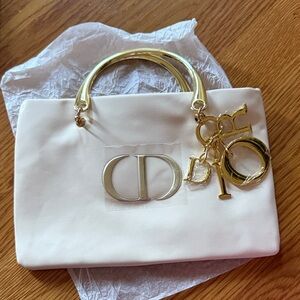 Dior pouch converted into bag.